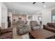 Open living room with view of kitchen and dining area at 27606 W Tonopah Dr, Buckeye, AZ 85396