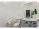 Small bathroom with gray vanity, quartz countertop, and toilet at 2780 S Equestrian Dr # 102, Gilbert, AZ 85295