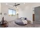 Bright bedroom with a round bed and ceiling fan at 2780 S Equestrian Dr # 102, Gilbert, AZ 85295