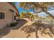 Backyard with gravel, trees and lake view at 2805 N 111Th Dr, Avondale, AZ 85392