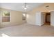 Bright bedroom with ceiling fan and double door closet at 2805 N 111Th Dr, Avondale, AZ 85392