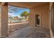 Covered patio with lake view and access to backyard at 2805 N 111Th Dr, Avondale, AZ 85392