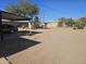 Large backyard with gravel and covered parking at 302 E Beech Ave, Casa Grande, AZ 85122