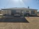 Carport and view of house from backyard at 302 E Beech Ave, Casa Grande, AZ 85122