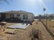 Backyard with patio and small storage shed at 302 E Beech Ave, Casa Grande, AZ 85122