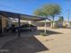 Backyard with carport and storage shed at 302 E Beech Ave, Casa Grande, AZ 85122