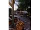 Backyard patio with seating and garden at dusk at 3036 W Gail Rd, Phoenix, AZ 85029