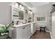 Double vanity bathroom with white cabinets at 3036 W Gail Rd, Phoenix, AZ 85029