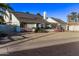 Single story house with solar panels and gravel yard at 3036 W Gail Rd, Phoenix, AZ 85029