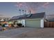 House with solar panels and a two-car garage at 3036 W Gail Rd, Phoenix, AZ 85029