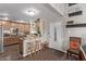 Open concept kitchen with breakfast bar and hardwood floors at 3036 W Gail Rd, Phoenix, AZ 85029