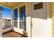 Front entrance with a white door and sidelights, leading into the home at 305 S Val Vista Dr # 71, Mesa, AZ 85204