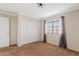 Well-lit bedroom with double door closet and neutral decor at 310 N 65Th St # 9, Mesa, AZ 85205