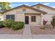 Inviting exterior with landscaping and a paved walkway at 310 N 65Th St # 9, Mesa, AZ 85205