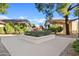 Landscaped courtyard entrance with a manicured garden at 310 N 65Th St # 9, Mesa, AZ 85205