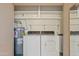 Neat laundry room with washer, dryer, and extra shelving at 310 N 65Th St # 9, Mesa, AZ 85205