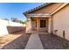 Front door entrance with walkway and desert landscaping at 34717 N Picket Post Dr, Queen Creek, AZ 85142