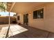 Covered patio with sliding glass doors to interior at 34717 N Picket Post Dr, Queen Creek, AZ 85142