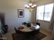 Bright dining area with round table and four chairs at 4241 N Pebble Creek Pkwy # 13, Goodyear, AZ 85395