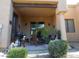 Covered patio with seating and built-in grill at 4241 N Pebble Creek Pkwy # 13, Goodyear, AZ 85395