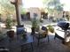 Relaxing patio with seating area and grill at 4241 N Pebble Creek Pkwy # 13, Goodyear, AZ 85395