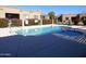 Community pool and spa with ample deck space at 4241 N Pebble Creek Pkwy # 13, Goodyear, AZ 85395