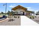 Modern community clubhouse with covered walkway and landscaping at 4249 E Sagebrush St, Gilbert, AZ 85296