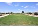 Large grassy community area with park benches and pathways at 4249 E Sagebrush St, Gilbert, AZ 85296