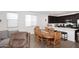 Cozy dining area with a rustic wooden table and chairs next to the kitchen at 4249 E Sagebrush St, Gilbert, AZ 85296