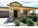 Home exterior with covered porch and stone accents at 4249 E Sagebrush St, Gilbert, AZ 85296