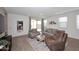 Living room with gray sofas and view of kitchen at 4249 E Sagebrush St, Gilbert, AZ 85296