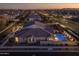 Aerial view showcasing a home with pool and neighborhood setting at 4552 S Flare --, Mesa, AZ 85212