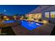 Resort-style backyard with a large pool, spa, and plenty of space for lounging at 4552 S Flare --, Mesa, AZ 85212