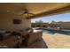 Enjoy the view from this comfortable covered patio, complete with a fireplace at 4552 S Flare --, Mesa, AZ 85212