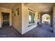 Bright and airy entryway with tile flooring and a charming bench at 4552 S Flare --, Mesa, AZ 85212