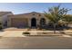 Single-story home with a tile roof and arched entryway at 4552 S Flare --, Mesa, AZ 85212