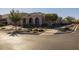 Beautiful home exterior with landscaped yard and inviting walkway at 4552 S Flare --, Mesa, AZ 85212