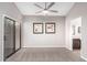 Bright and airy bedroom with a ceiling fan and neutral decor at 4698 W Harrison St, Chandler, AZ 85226