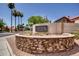 Attractive community entrance sign with stonework landscaping at 4698 W Harrison St, Chandler, AZ 85226