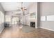 Bright living room with tile floors and a cozy fireplace at 4698 W Harrison St, Chandler, AZ 85226