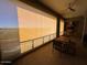 Covered patio with outdoor seating and sunset views at 5250 E Deer Valley Dr # 403, Phoenix, AZ 85054