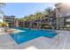 Resort-style swimming pool with plenty of lounge chairs at 5250 E Deer Valley Dr # 403, Phoenix, AZ 85054