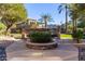 Landscaped courtyard with a stone water feature at 5250 E Deer Valley Dr # 403, Phoenix, AZ 85054