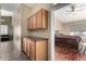 Guest bedroom with wood floors and built-in storage at 5317 W Glenview Pl, Chandler, AZ 85226