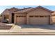 Two-story house with tile roof, two-car garage, and desert landscaping at 5317 W Glenview Pl, Chandler, AZ 85226