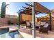 Relaxing patio area with pergola and comfortable seating at 5317 W Glenview Pl, Chandler, AZ 85226