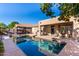 Inviting backyard oasis featuring a sparkling pool and patio at 5317 W Glenview Pl, Chandler, AZ 85226