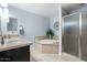 Spa-like bathroom with soaking tub and glass shower at 5350 E Deer Valley E Dr # 1279, Phoenix, AZ 85054