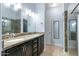 Elegant bathroom with a double vanity and a large walk-in shower at 5350 E Deer Valley E Dr # 1279, Phoenix, AZ 85054