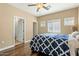 Bright bedroom with a queen bed and en-suite bathroom access at 5350 E Deer Valley E Dr # 1279, Phoenix, AZ 85054